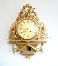 Cartel clock - Wood - Mid 20th century - $275.00