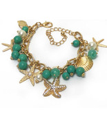 Gold Tone Starfish Seashell Coastal Beach Nautical Charm Bracelet - $14.99