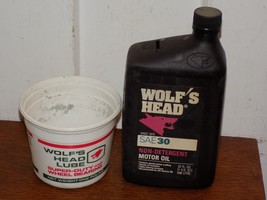 Pair of Vintage Wolf’s Head plastic containers - $541.44 MXN