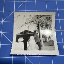 Vintage Photograph Couple Making Snowman Winter 1960 Man Woman - $6.29