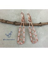 Handmade copper earrings: criss cross wire wrapped beaded rectangles - €23,96 EUR