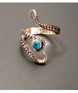 Octopus tentacle rose gold crystal rings - $289.97 MXN