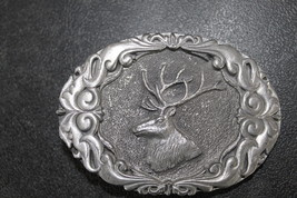 Elk head belt buckle- NEW - $246.52 MXN