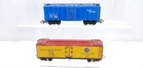 2 HO Scale Box Cars With Strange Couplers - $20.00