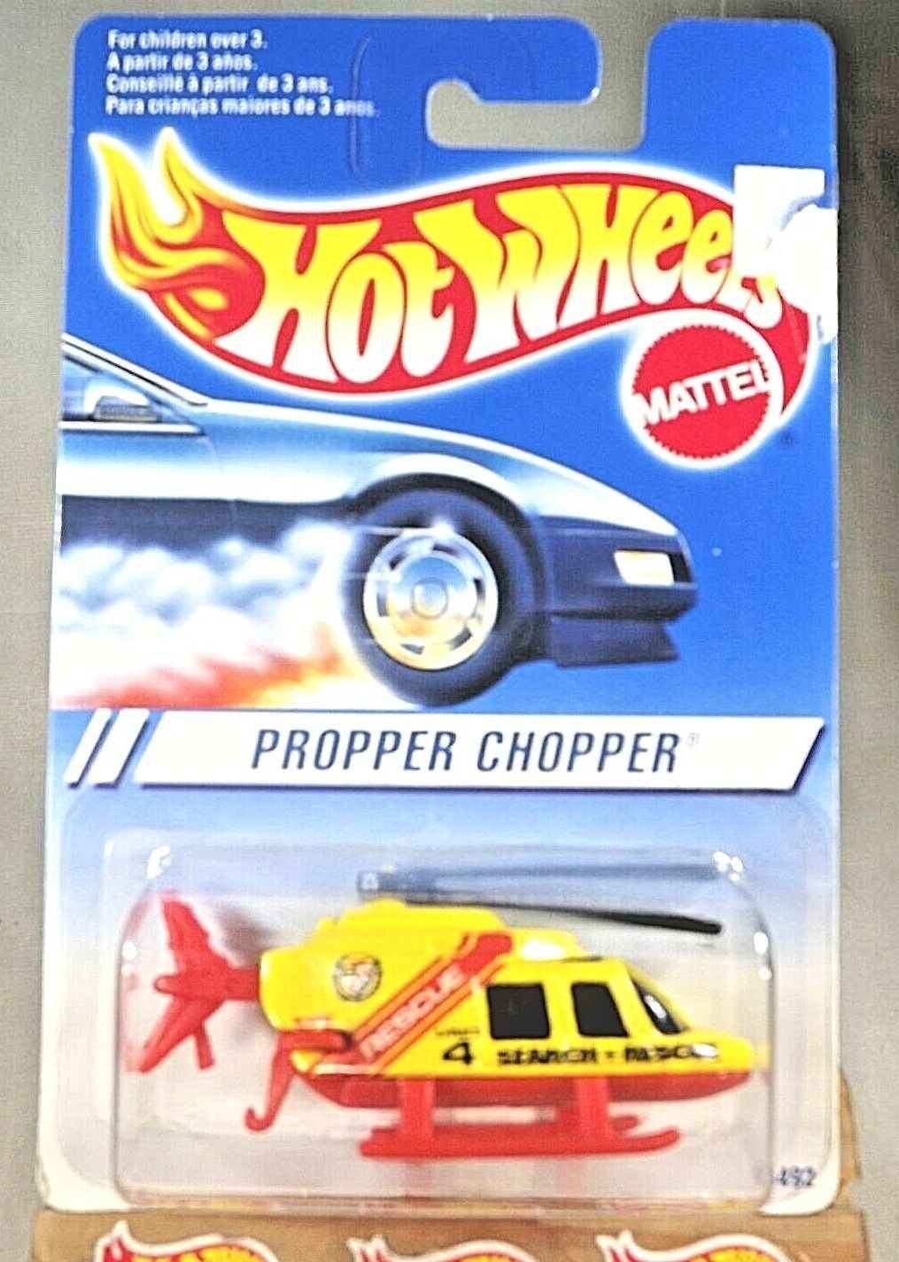 1995 Hot Wheels International Card  PROPPER CHOPPER Yellow Red-Base Black-Prop
