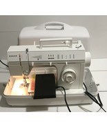 Singer Sewing Machine 5705C with Foot Pedal, Manual, and Extras (see ima... - $168.29