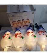 GE StayBright Snowman Pathway light Markers x4 White Christmas blow mold... - $420.39 MXN