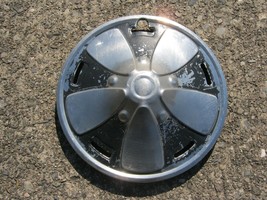 One factory original 1975 to 1979 Toyota Corolla 13 inch hubcap wheel cover - $23.03
