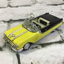 New Ray 1955 Pontiac Star Chief Diecast Convertible Car Yellow Black 1:4... - $11.88