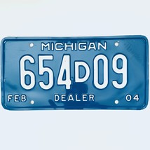 2004 United States Michigan Base Dealer License Plate 654D09 - £13.32 GBP