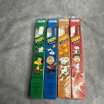 Peanuts Snoopy New Toothbrush Lot Of 4 Vtg 1986 Charlie Brown Lucy Woodstock - $21.99