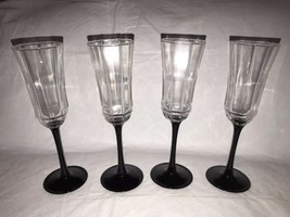 Set Of 4 Luminarc Crystal Champagne Flutes Black Stem Octime France 8 1/... - $24.99