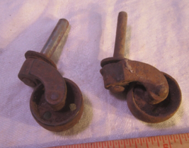 Lot Of 2 Vintage Rusty Metal Holes Raised Wheels Castors 1&quot; Diameter Craft A - £17.98 GBP