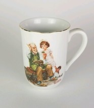 Norman Rockwell Museum Gold Rim Cup Mug “The Cobbler” - $6.88