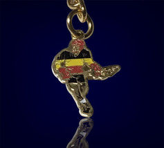 Vintage lacrosse player keychain Black Yellow Red Team Colors - £6.28 GBP