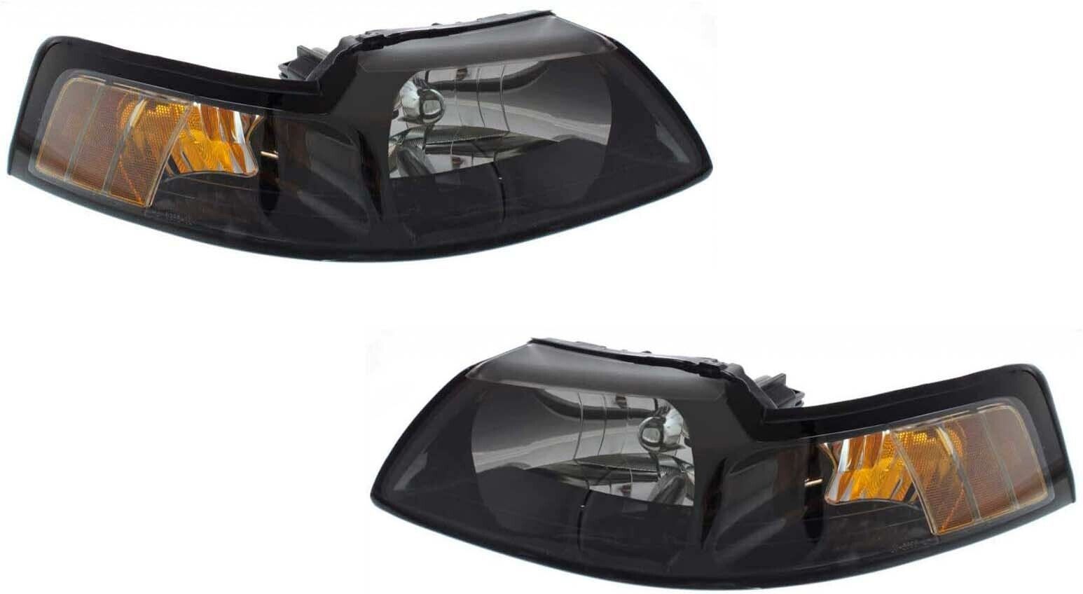 Primary image for Headlights For Ford Mustang 1999 2000 2001 2002 2003 2004 Black Trim Pair