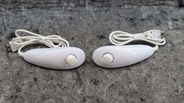 Lot of 2 Genuine OEM Official Nintendo Wii Nunchuck Controller (RVL-004) - $185.90 MXN