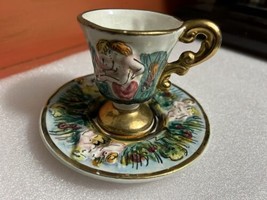 Vintage Capodimonte cup saucer set footed demitasse espresso putti gilded cherub - £21.79 GBP