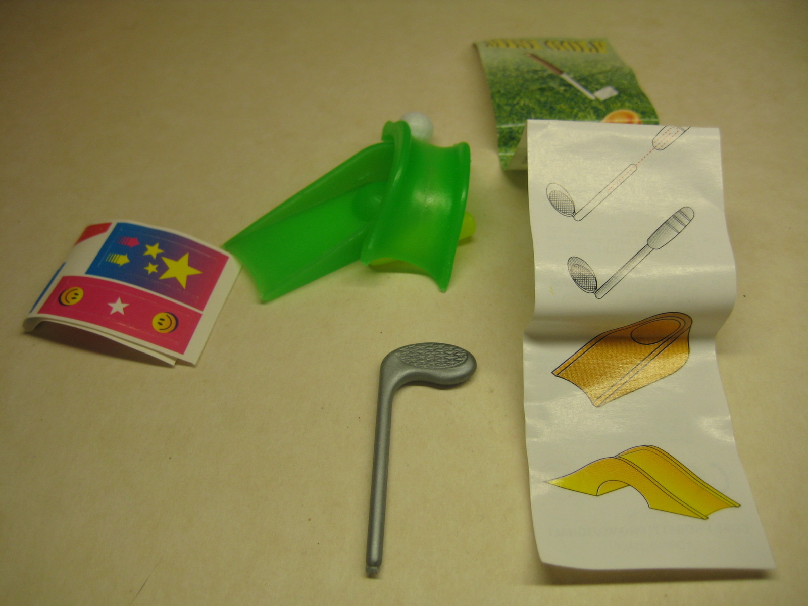 Cose Progetti - Mini Golf - green/yellow + paper - Surprise egg - $1.50