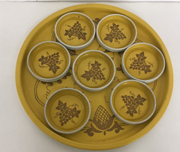 vintage round metal serving tray with drink coasters yellow with gold fr... - $15.79