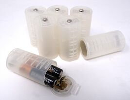 D-CELL BATTERY ADAPTER, TAKES (2) AA BATTERIES, SET OF 7 - NEW - $14.48