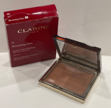 Bronzing Duo by Clarins 10 g mineral powder compact 03 Dark R60 New box torn - $10.99