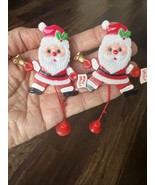 2-Vintage Christmas Brooch Santa Moving Eyes Jump Jacks Pin Bell Merry C... - $41.16 CAD