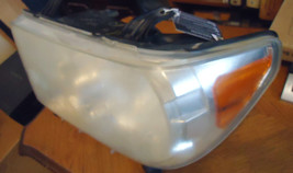 2009-2013 Toyota Tundra    Headlight Assembly Power adjuster/level   Left Side - $53.96