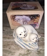 cuddling seals statue - $17.11 CAD