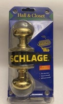 Schlage Hall and Closet Bright Brass Door Handle  - $13.23