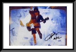 Angus Young signed AC/DC photo - £319.93 GBP