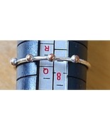 Lot of 7 assorted sizes 5.5 to 8.5 US rings includes etched and rhinestones - €11,07 EUR