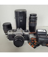 Olympus OM-10 35mm Film SLR Camera Package- 3 Lens Flash 50mm f/1.8 135m... - $200.37 CAD