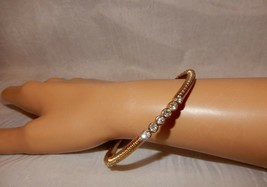 Beautiful vintage Graziano gold tone rhinestone accented bangle bracelet - $10.00