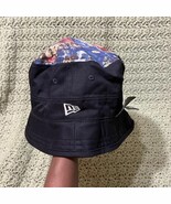 New Era fly your own flag reversible black bucket hat with a floral denim top  - $45.00