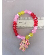 Red/yellow handmade Glass beaded Gingerbread bracelet - $117.24 MXN