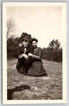 RPPC Woman with Young Man in Field Real Photo Postcard I21 - £4.75 GBP