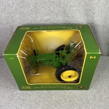 Ertl JOHN DEERE Ertl  MODEL A Green TRACTOR w/Farmer 1:16  New In Box - $46.75