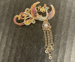 Pink &amp; Gold Phoenix Brooch on Gold Tone - $213.82 MXN