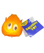 Glowing Puffer Orange Toy Soft PVC Lights Up Anti Stress Resistant 2”-NE... - $11.76