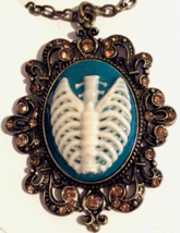 Gothic cameo style necklace backbone and ribs  (teal and white) handmade - $9.16