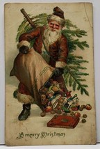 A Merry Christmas Long Robed Santa Emptying Sack of Toys Emb c1908 Postcard F14 - £15.94 GBP