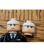 Lot of 2 LEGO Batman Minifigure Head Batman Light Flesh - $109.00 MXN