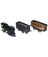 Vintage Cast Iron Wind Up Train Locomotive Engine A.F. 12 with 2 passeng... - $108.99 CAD