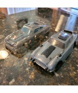 Lot 2 Vintage 1/32 Scale James Bond 007 Aston Martin Clear &amp; Gray Slot C... - €34,45 EUR