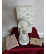 This is a Precious Moments #110116 December Figurine (#2627) - £15.68 GBP