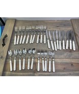 Vintage MCM Carnival 29 Piece White Handle Silverware Stainless Flatware - £26.22 GBP