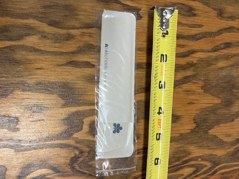 Nikko hotels international vintage plastic pocket comb still in original package Item image 2