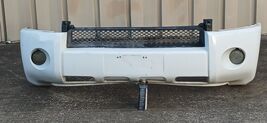 2006-2009 MITSUBISHI RAIDER FRONT BUMPER COVER ASSEMBLY WHITE .. READ.... - $12,308.66 MXN