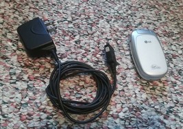 LG Aloha LX140 (Virgin Mobile) White Cell Phone Bundled w/ Charger + Bat... - $4.95